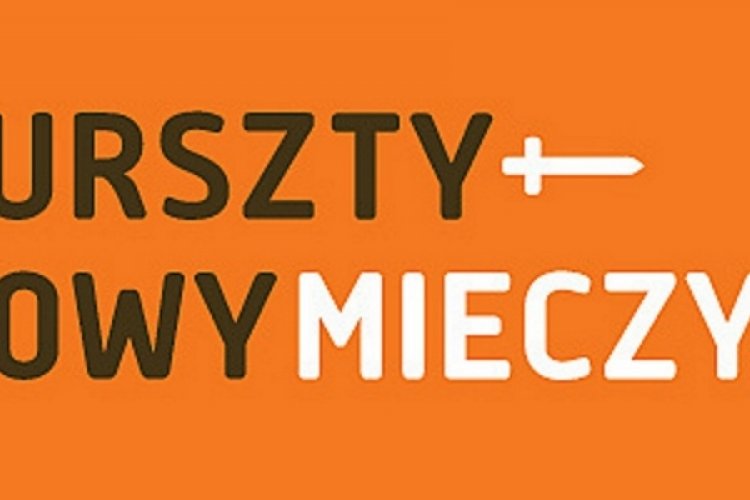 Logo Nagrody Bursztynowego Mieczyka: na pomarańczowym tle, napis Bursztynowy Mieczyk, pomiędzy wyrazami znajduje się rysunek miecza